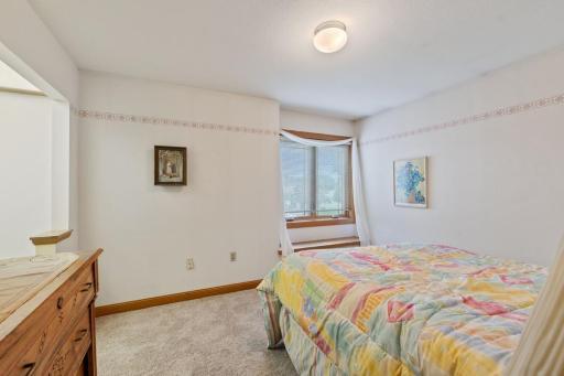 One of the upstairs bedrooms has walk in closet