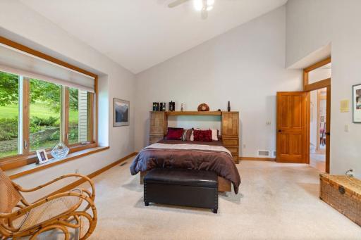 Double doors to primary suite, attractive transom window