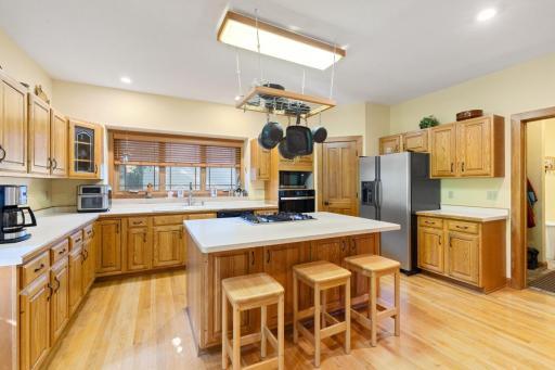 Center island kitchen with beautiful oak hardwood floors