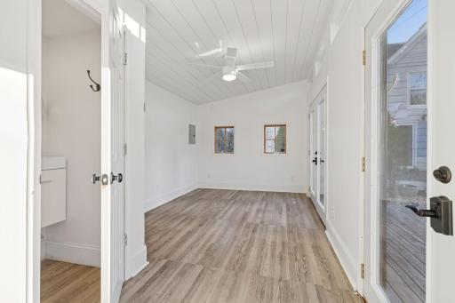 The auxiliary building in the backyard features a seasonal three-quarter bathroom. Add a heat source to create a great office, studio, workshop, or playhouse.