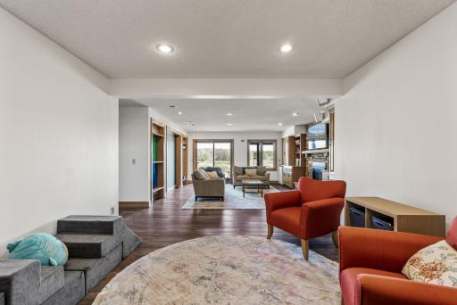 The walkout lower level is designed for connection and comfortâperfect for movie nights, game days, or quiet weekends at home.