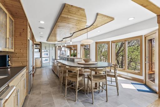 Designed for both serious chefs and entertainers, this kitchen blends high-end function with stylish comfort.