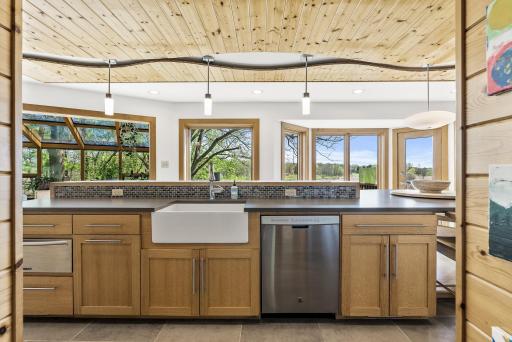 The oversized island is a true centerpieceâideal for gathering, prepping, serving, or late-night snacks.