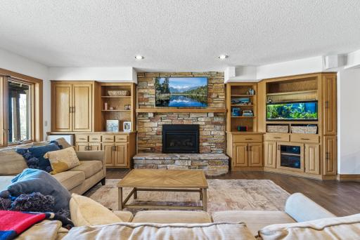 Warm up by the sleek gas fireplace, creating a cozy focal point for relaxing or entertaining year-round.