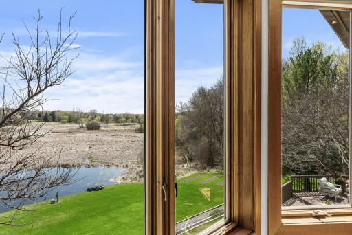 From the comfort of your primary suite, enjoy tranquil vistas of the pondânatureâs beauty right outside your window.