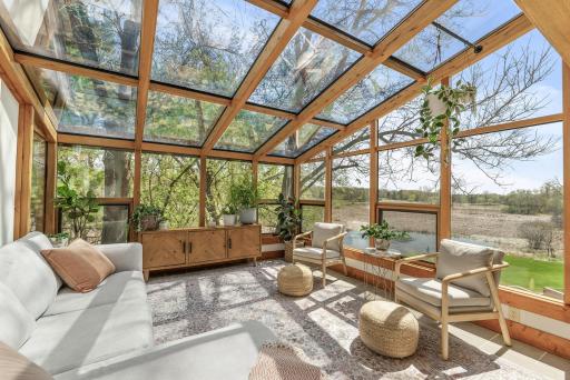 The elevated sunroom brings the outdoors in, offering a bright and peaceful retreat year-round. From vibrant fall foliage to snowy winter scenes, this sunroom offers a front-row seat to the beauty of every season.
