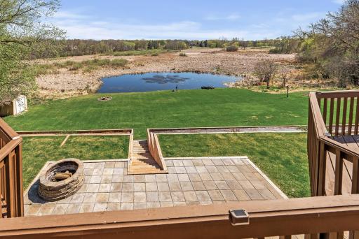 Tranquility at its finestâthis picturesque pond features a peaceful fountain and natural wildlife views.