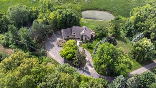 The approach sets the toneâlush trees line the quaint private road leading to your personal paradise, where tranquility and exclusivity meet.