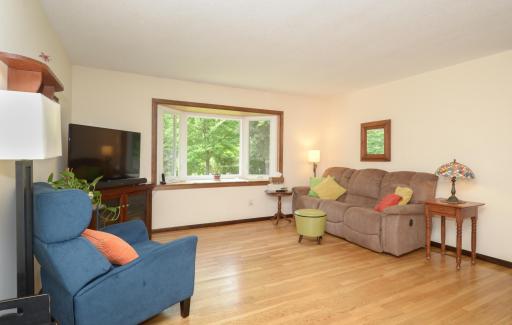 The bay window overlooks the beautiful backyard!