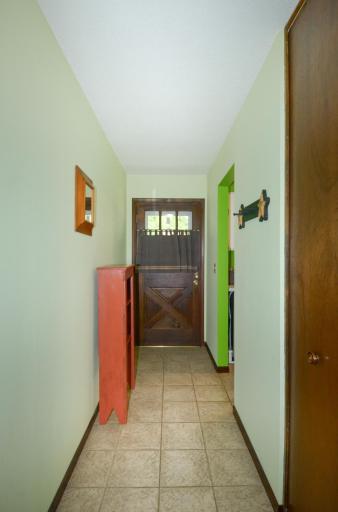 Front entrance-greet your guests in style. Door on the right is the pantry!