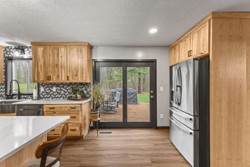 Stainless Upgraded Refrigerator & Walkout to Large Patio and Nature