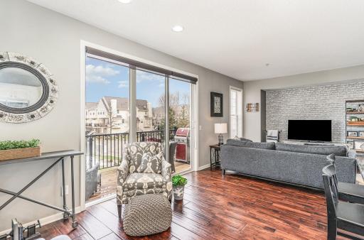 Huge windows! Gorgeous hardwood floors, darker brown in person