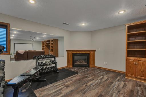 Photo for 5801 16th Street N, Saint Cloud, MN 56303 - Listing #6710576 Ample room in lower level living room with gas fireplace