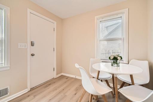Eat-in kitchen that leads to the back yard.