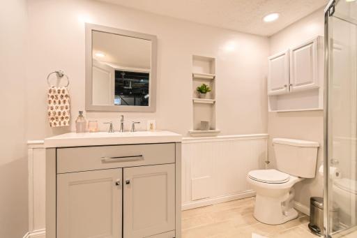 Spacious 3/4 bath with a walk-in shower in the basement.