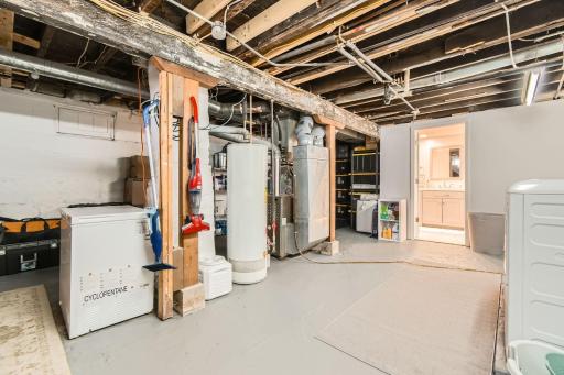 Clean basement with laundry and the 3/4 bath.
