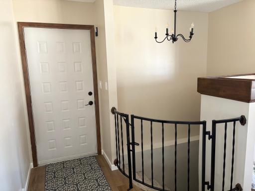 Main Floor Garage Entrance and Stairs to Basement