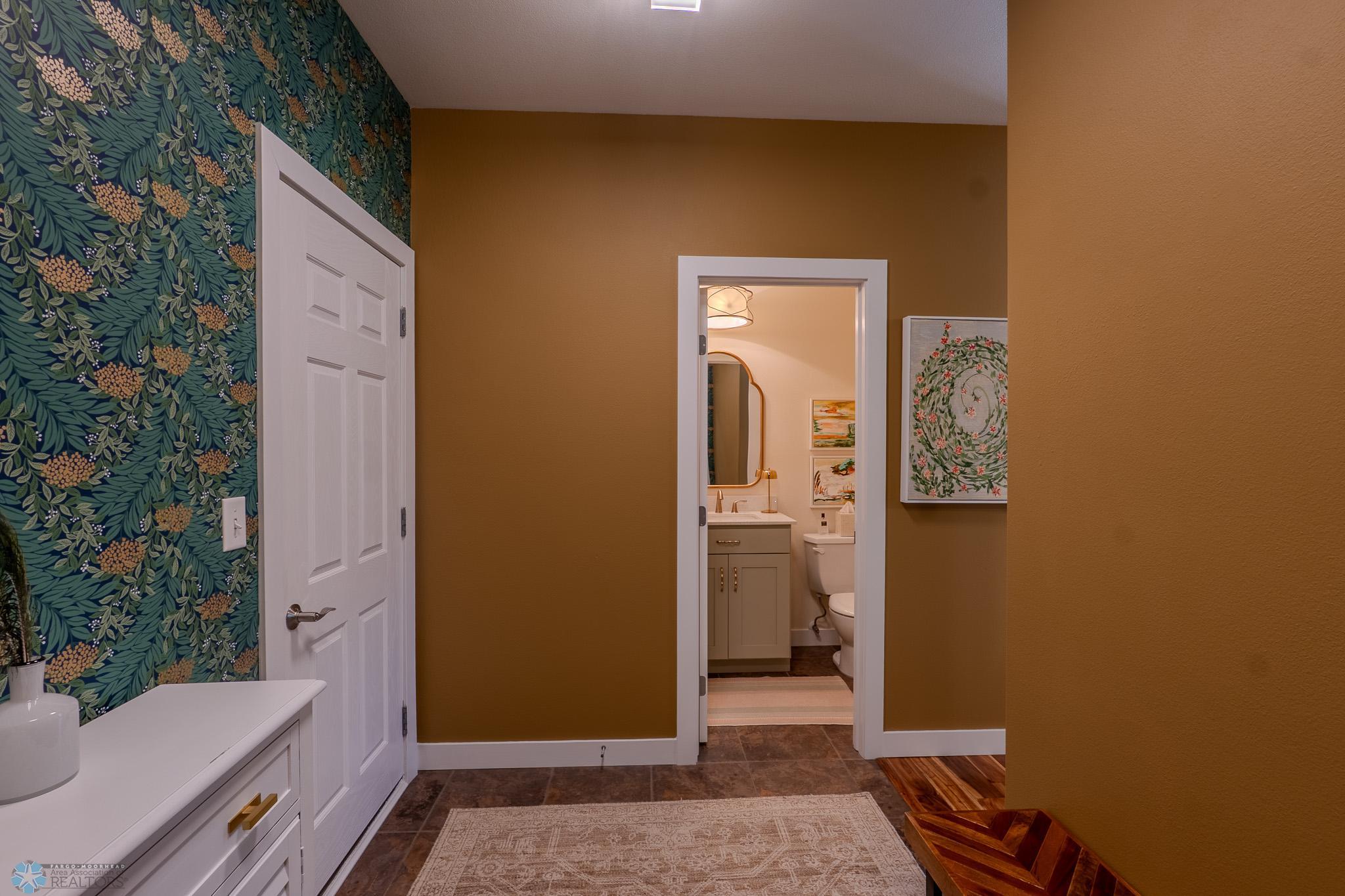 Mudroom off of Garage w/ Half Bath