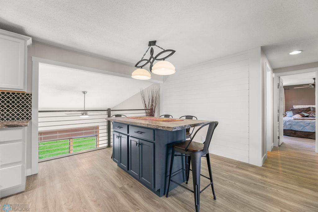 Eat-in kitchen with island top and seating