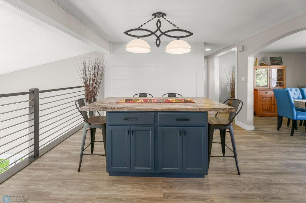 Prep island or breakfast bar with seating & storage