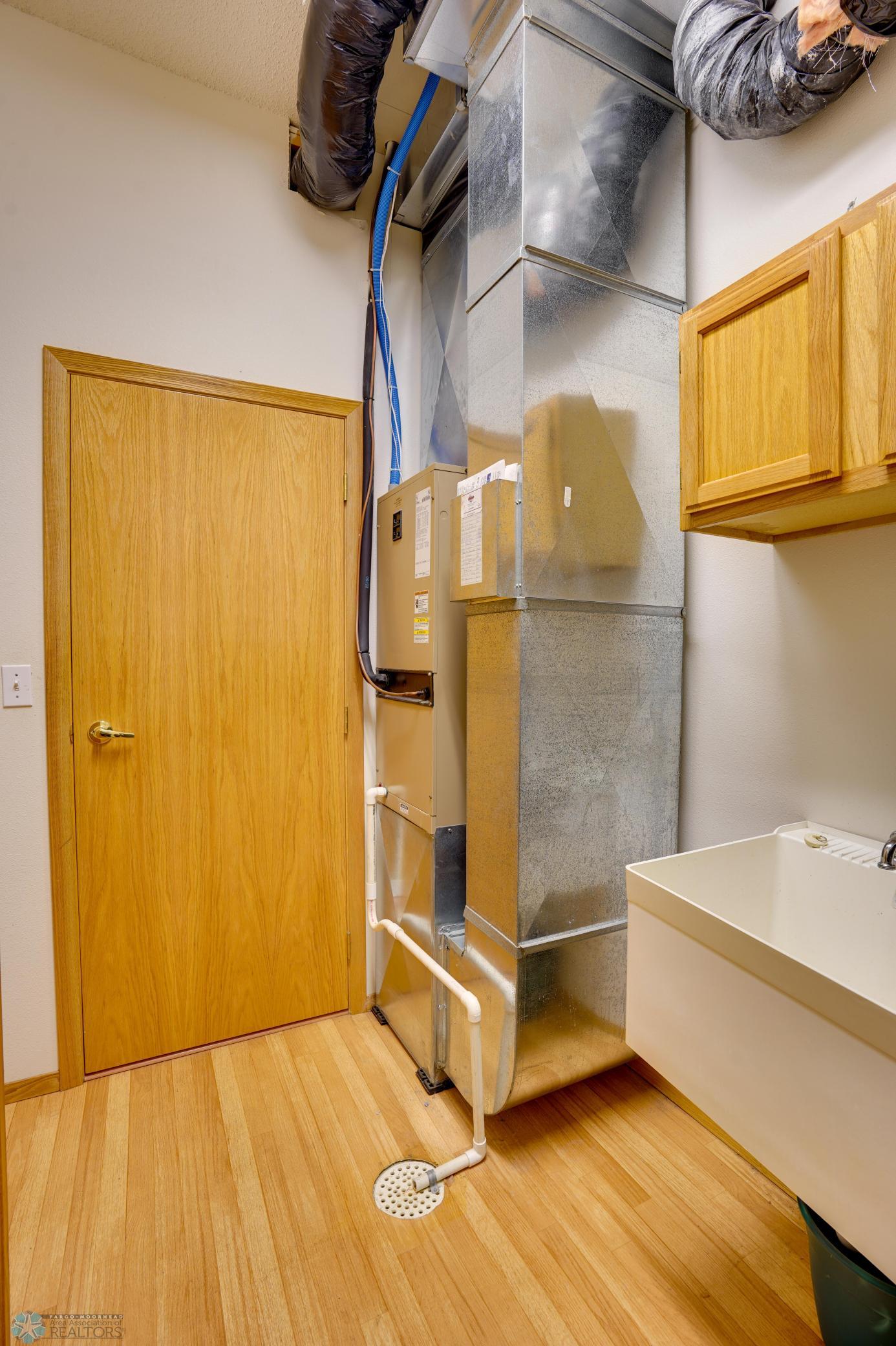 Furnace & utility sink in laundry room