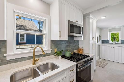New stainless steel appliances and soft-close cabinetry.