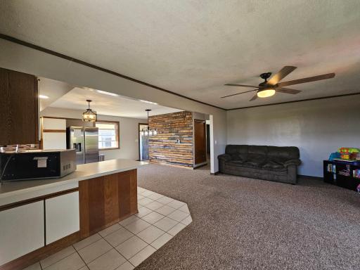 spacious and open kitchen/dining/living area