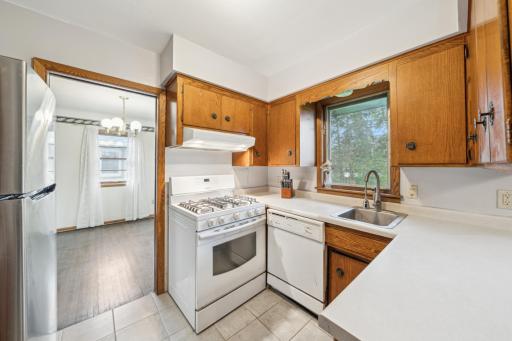 Kitchen with tiled floor and dining room just off the kitchen!