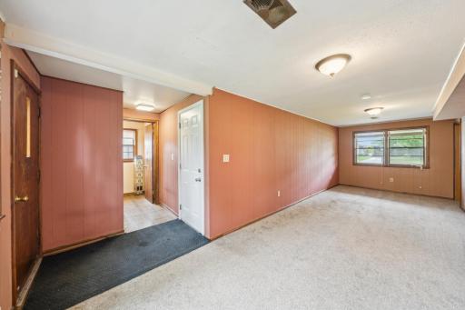 Family room and 1/2 bath area with access to the backyard!