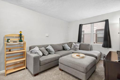 Cozy and ready for movie night or the latest sporting event. Freshly painted throughout the house.