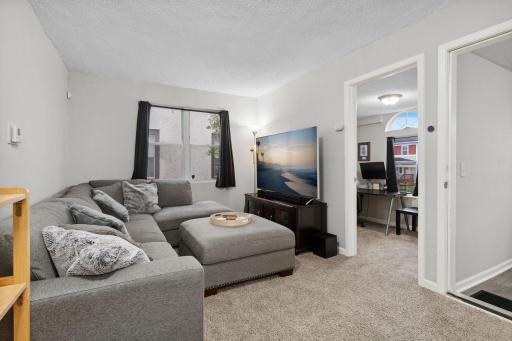 The 14x10 living room has newer carpeting.