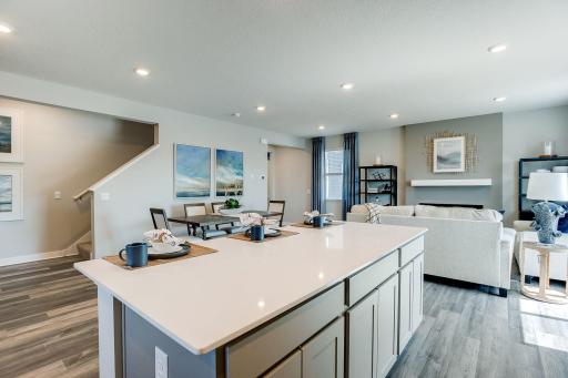 Oh - and the island is HUGE, and the perfect focal point to a kitchen that pours out into the rest of the main level living spaces!