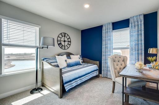 Each of the homes three additional bedrooms are also abundant in size! (Photo of model, colors may vary)