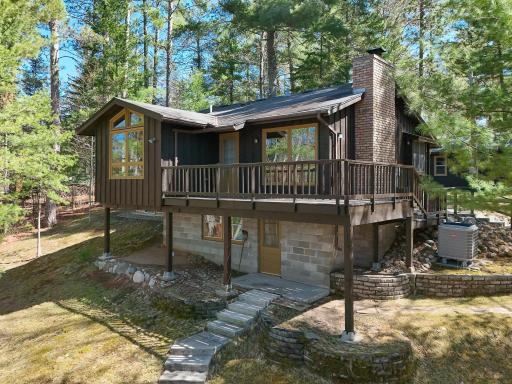 Lakeside view of walkout home on 1.02 acres