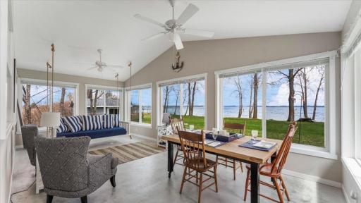 Four Season Porch with swing that turns into a bed