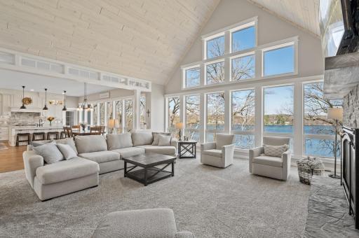 Can you say "show-stopper"? This is where you will want to stop and stare....great room that is more than "great" with vaulted ceiling and...those windows and that view!