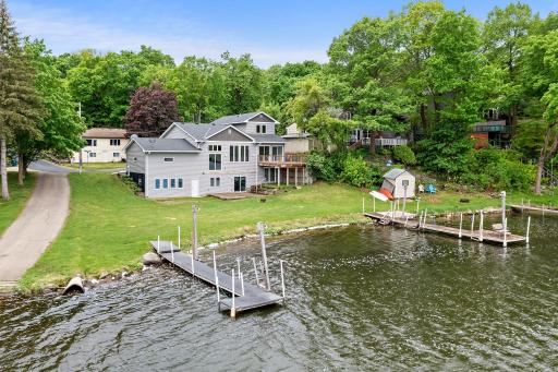 Welcome home to Dutch Lake. This home comes with 2 docks & 104ft of lakeshore, with big water views!