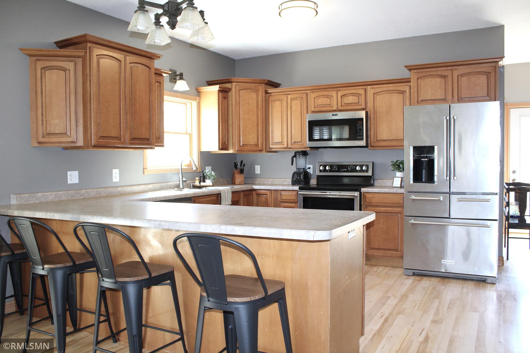 Beautifully refinished hardwood flooring in the kitchen and dining room!