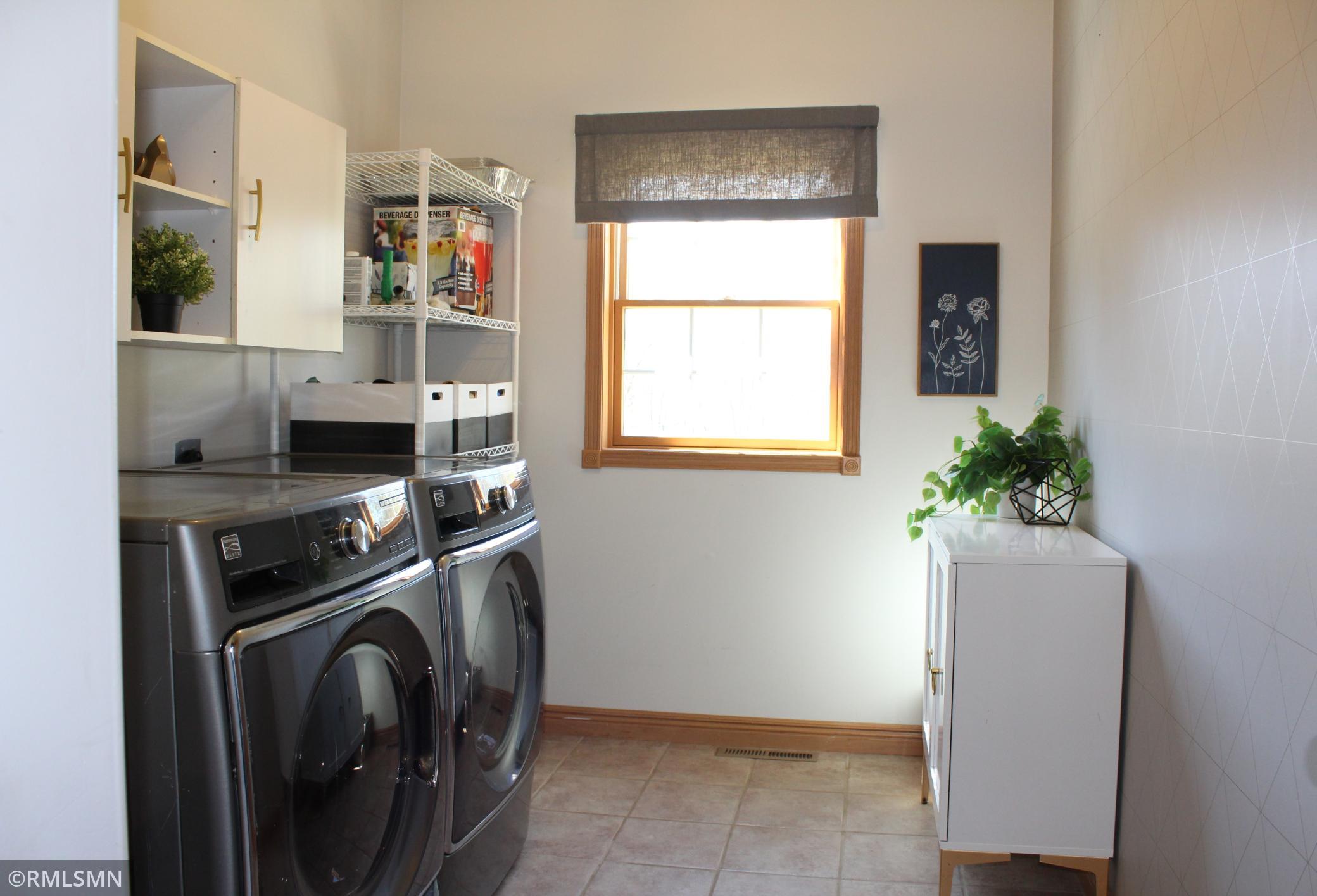 Enjoy the convenience of main floor laundry, located near the mudroom
