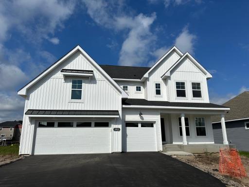 If you are looking for that classic white with black accent home this is the one!