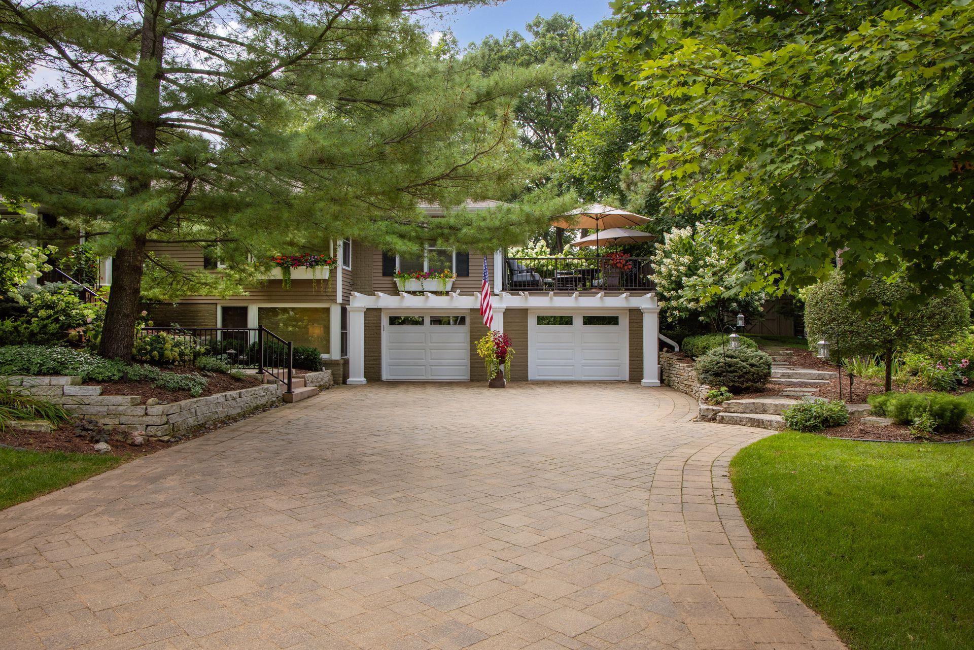 The spacious, wide driveway makes a statement