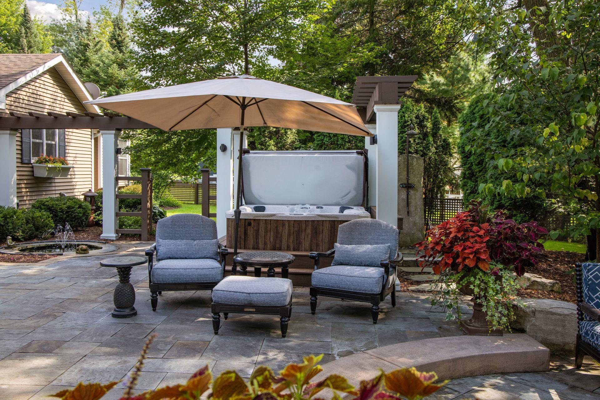 The hot tub integrates perfectly with this resort-like outdoor space