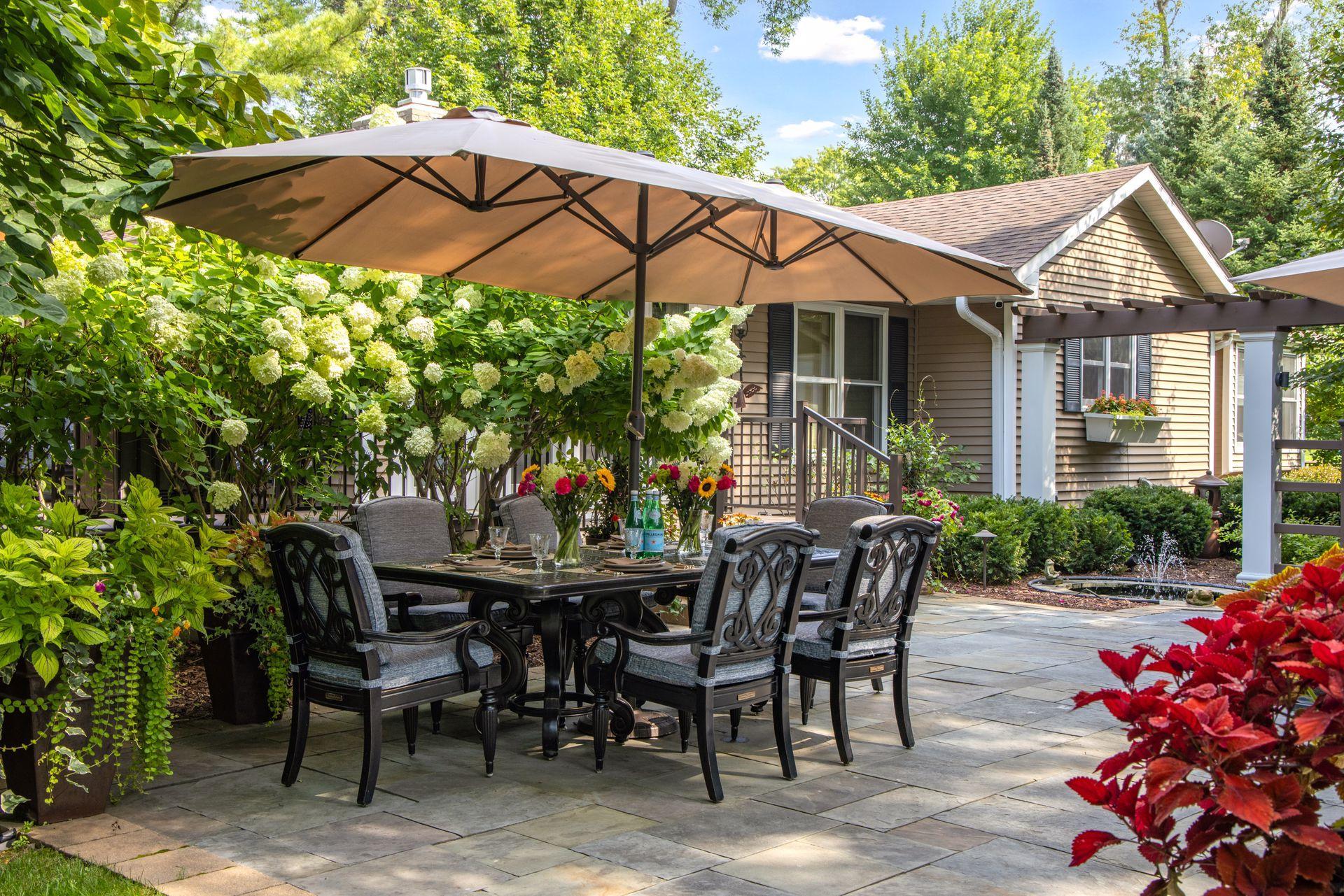Dining al fresco in this backyard feels like you're in a private dining room