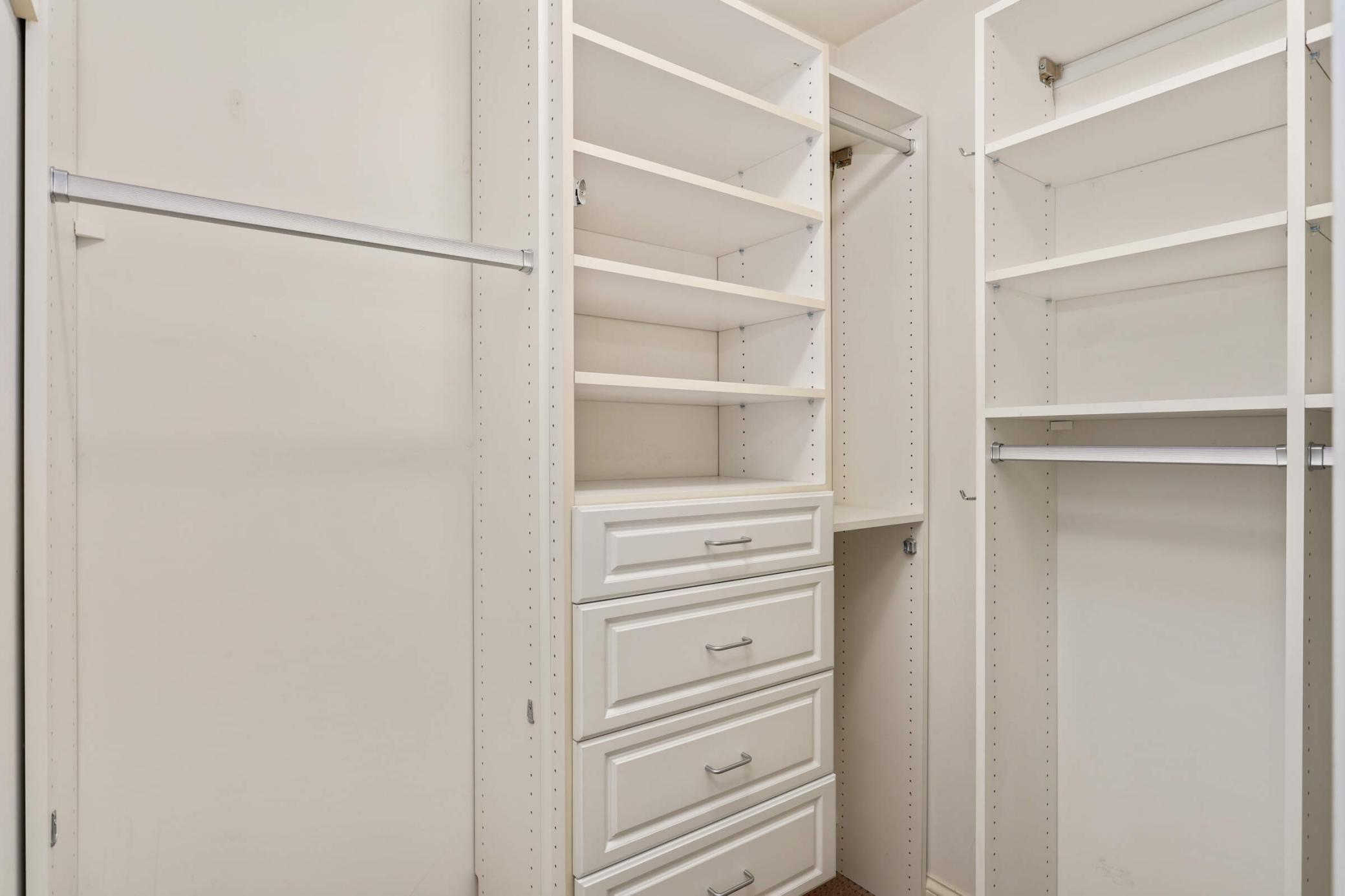 The primary suite walk-in closet