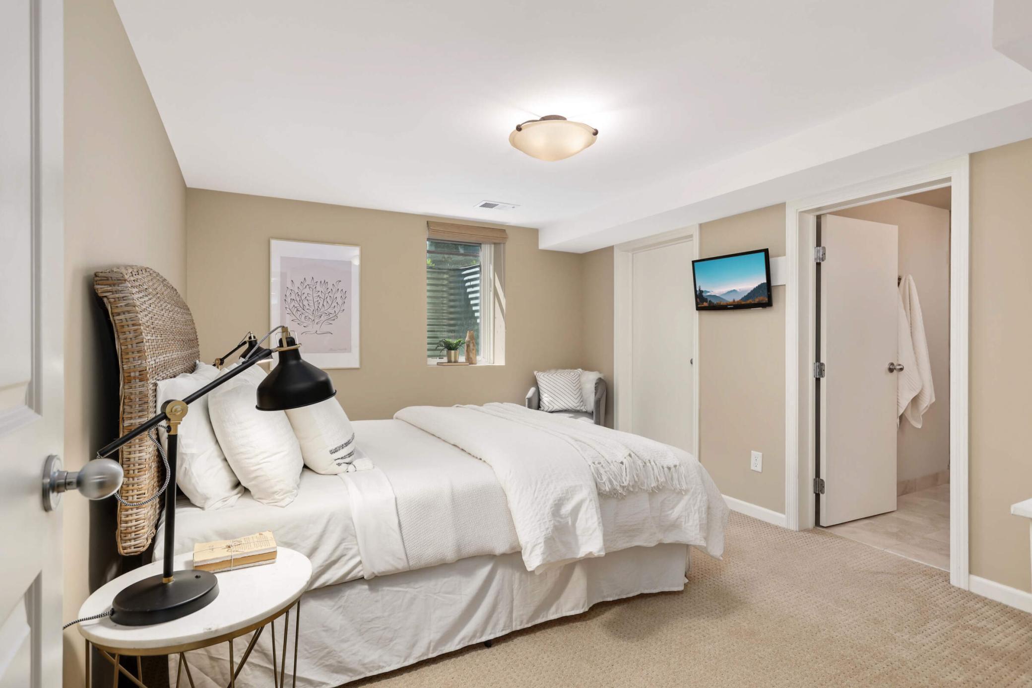 The lower level secondary suite features an incredible closet and private 3/4 bathroom