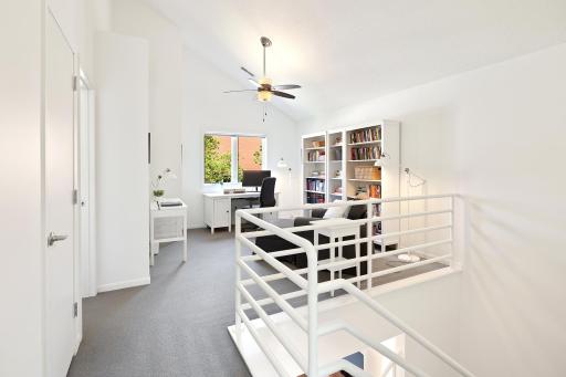 The upper level loft space is perfect for a home office.