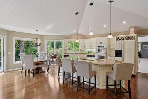 Expansive windows, dramatic vaulted ceilings, and gleaming hardwood floors are just a few of the design features of this stunning home