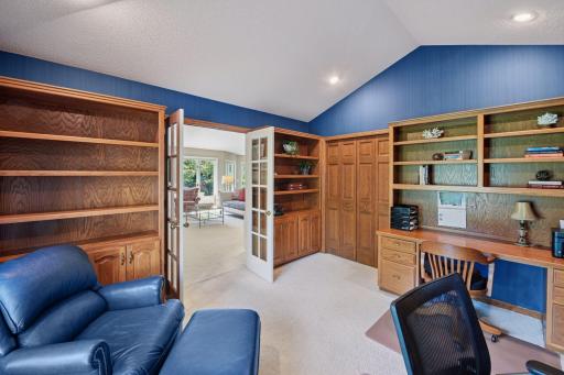 The french doors provide a sense of privacy from the other areas of the main floor living space