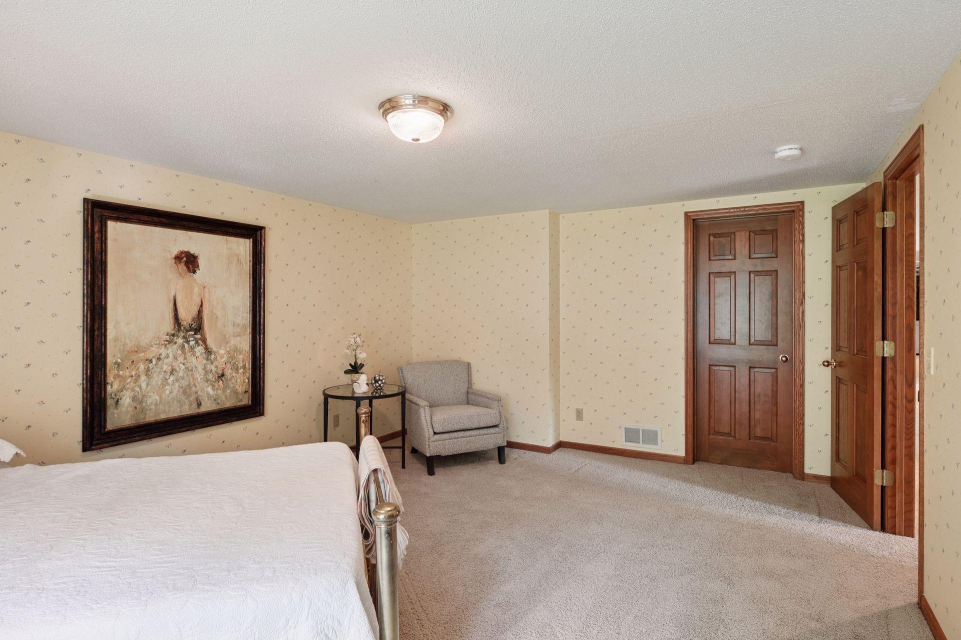 This bedroom offers en-suite access to the lower level bath