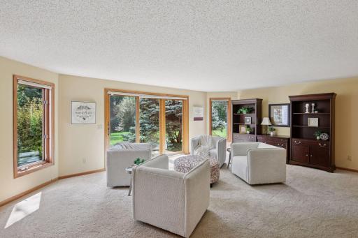 Additional gathering spaces are found in the home's lower level
